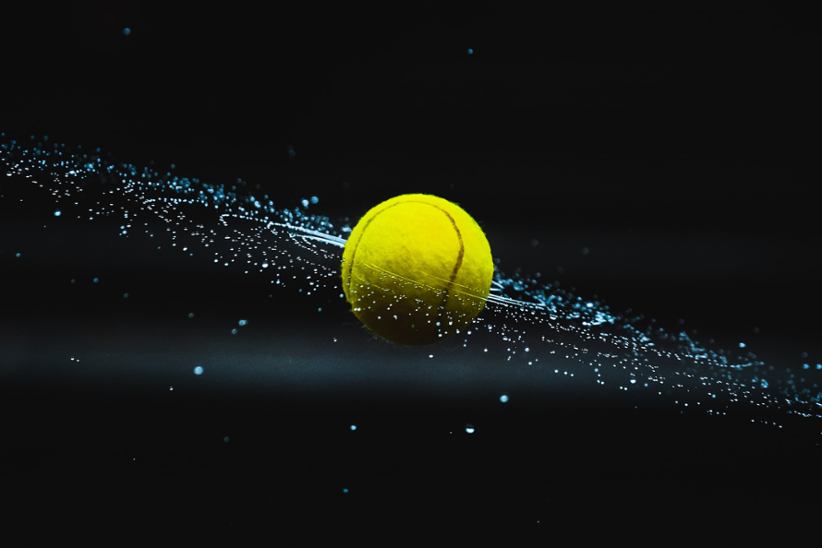 A tennis ball in sport.